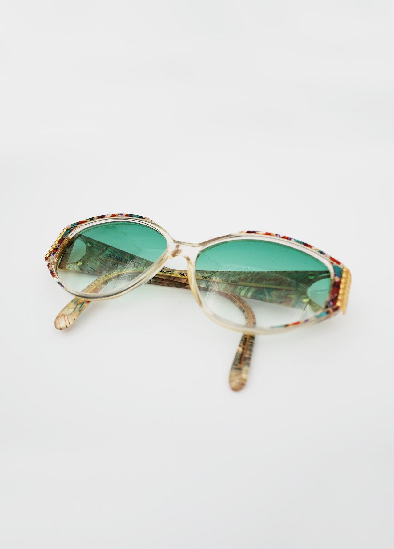 Lunette-Solaire-NinaRicci-Dore-Verre-Bleu-Motif-Vintage-04