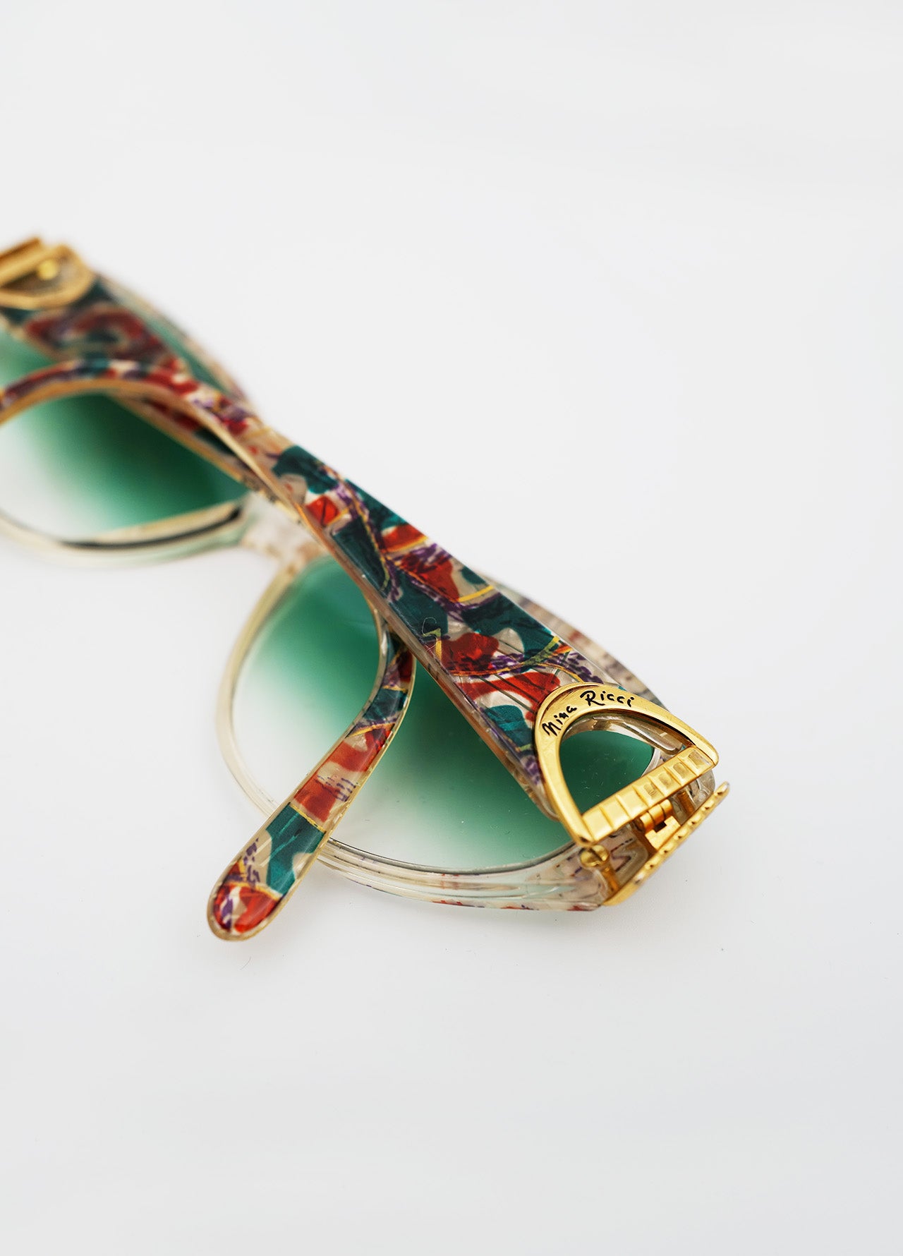 Lunette-Solaire-NinaRicci-Dore-Verre-Bleu-Motif-Vintage-03